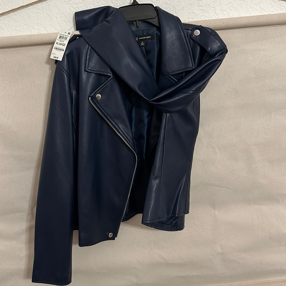 Navy blue faux leather jacket with front zip closure zip closure on sleeves